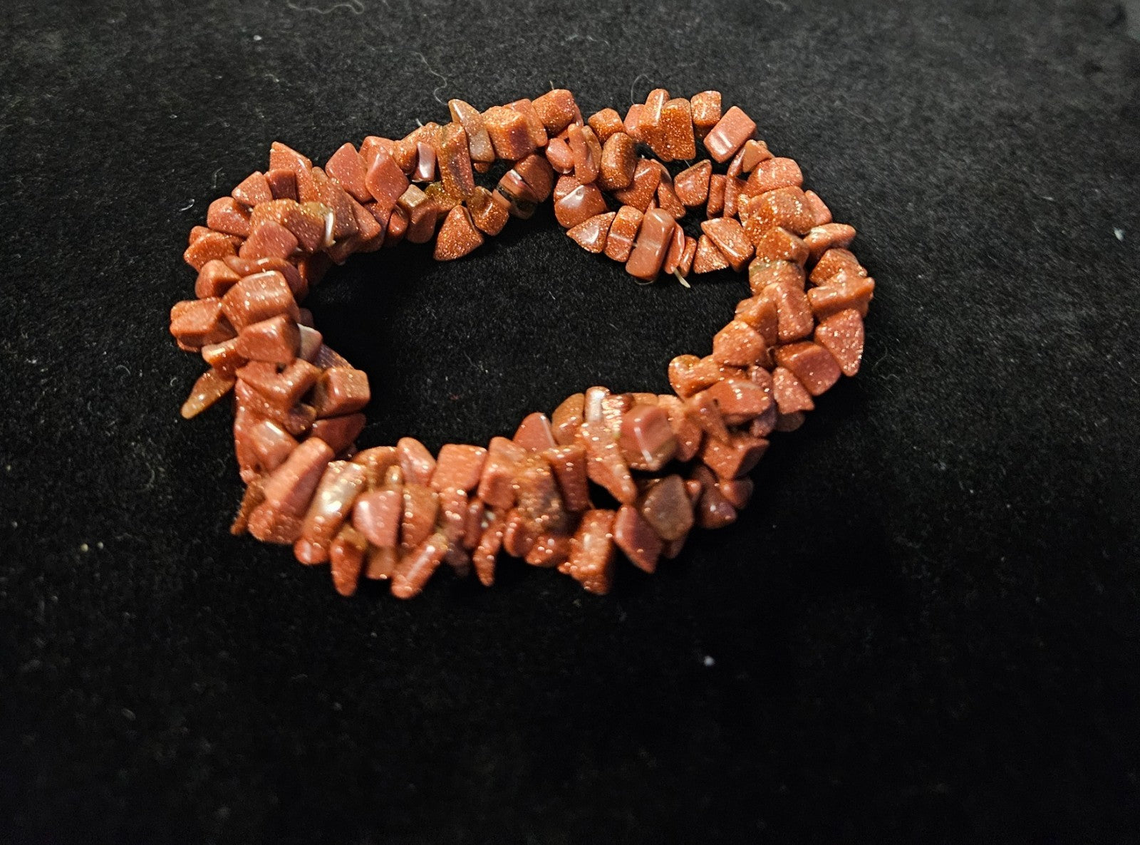 RED/COPPER COLORED GOLDSTONE BRACELET STRETCH GENTLY USED