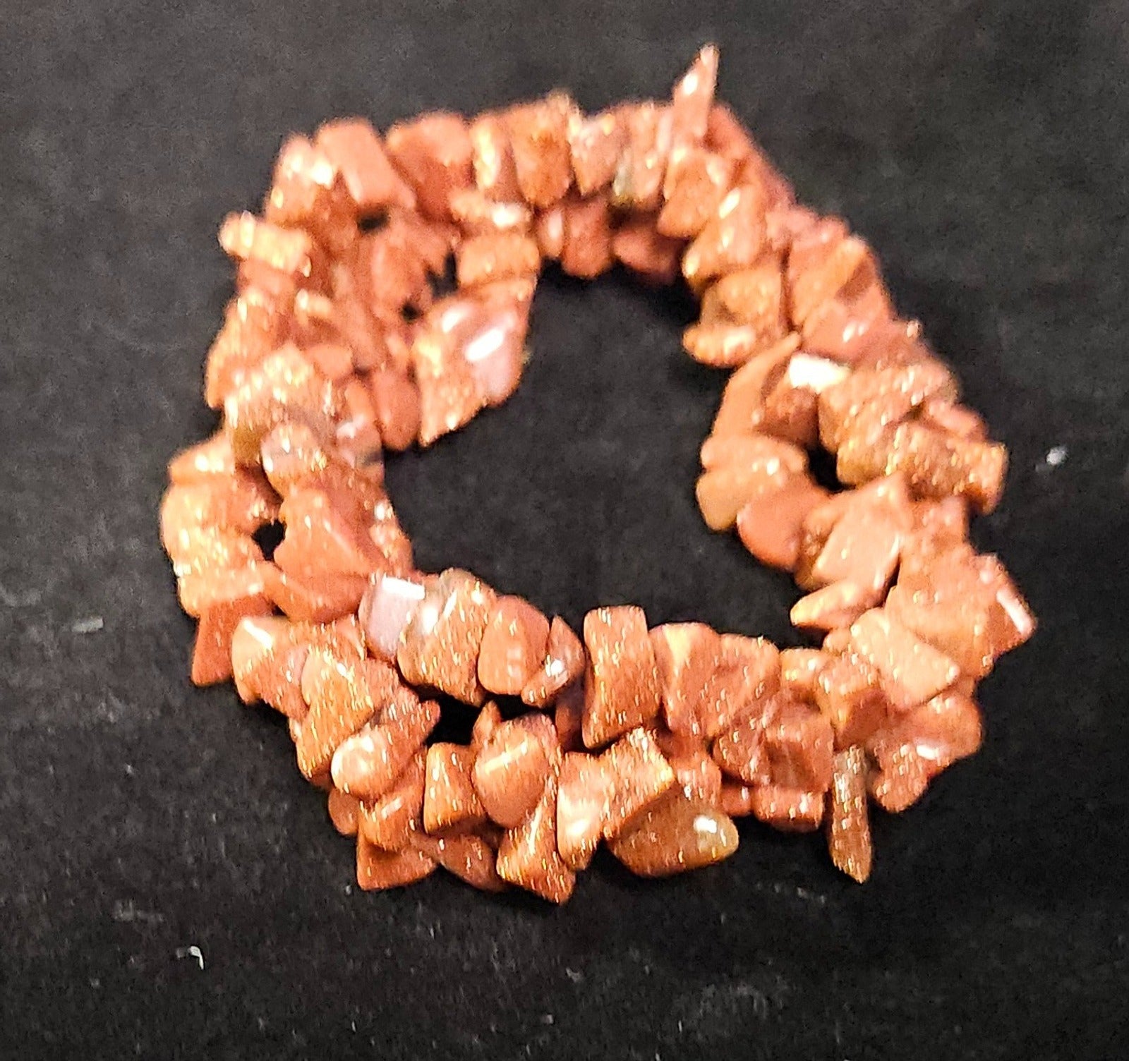 RED/COPPER COLORED GOLDSTONE BRACELET STRETCH GENTLY USED