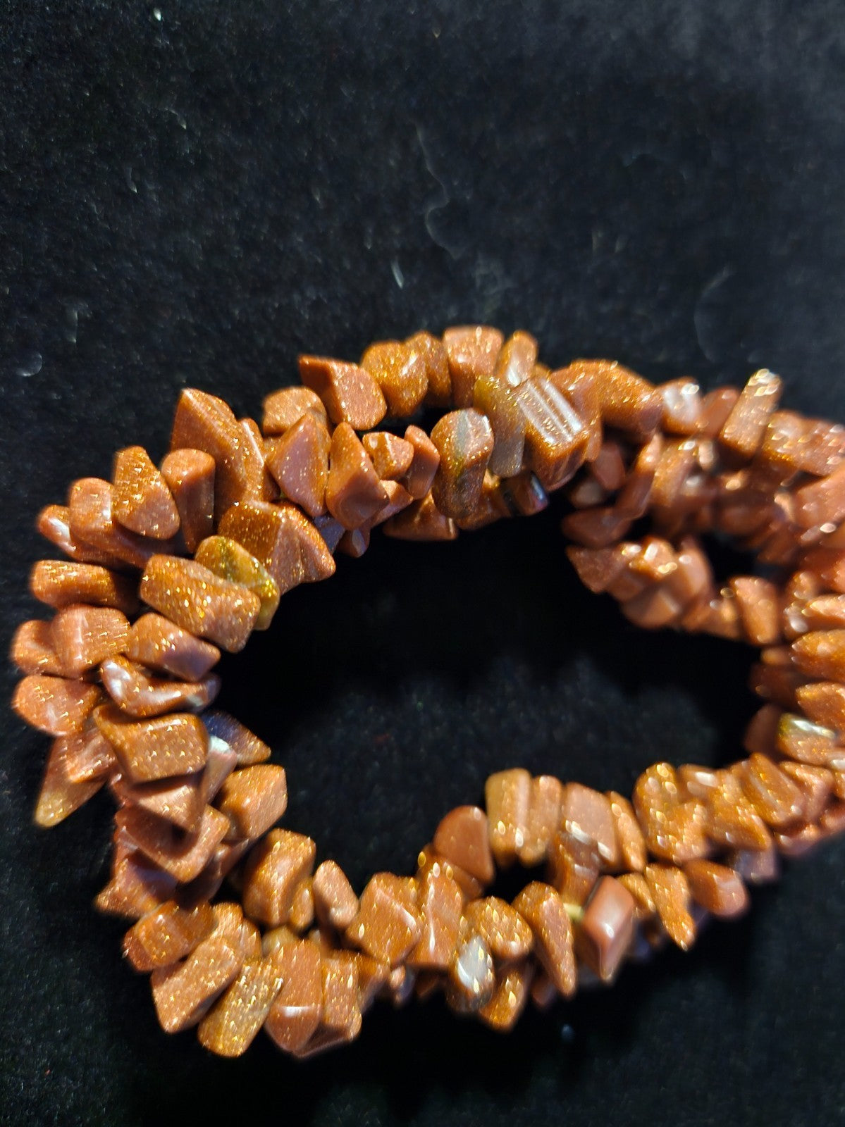 RED/COPPER COLORED GOLDSTONE BRACELET STRETCH GENTLY USED