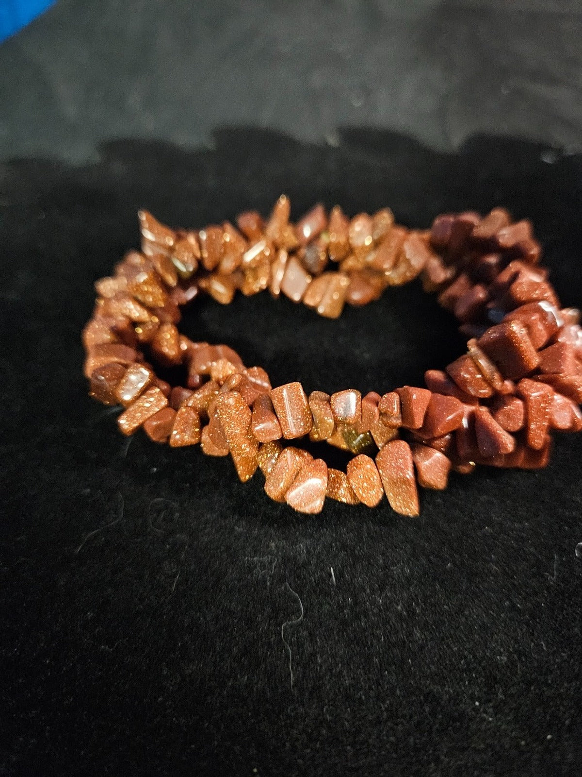 RED/COPPER COLORED GOLDSTONE BRACELET STRETCH GENTLY USED