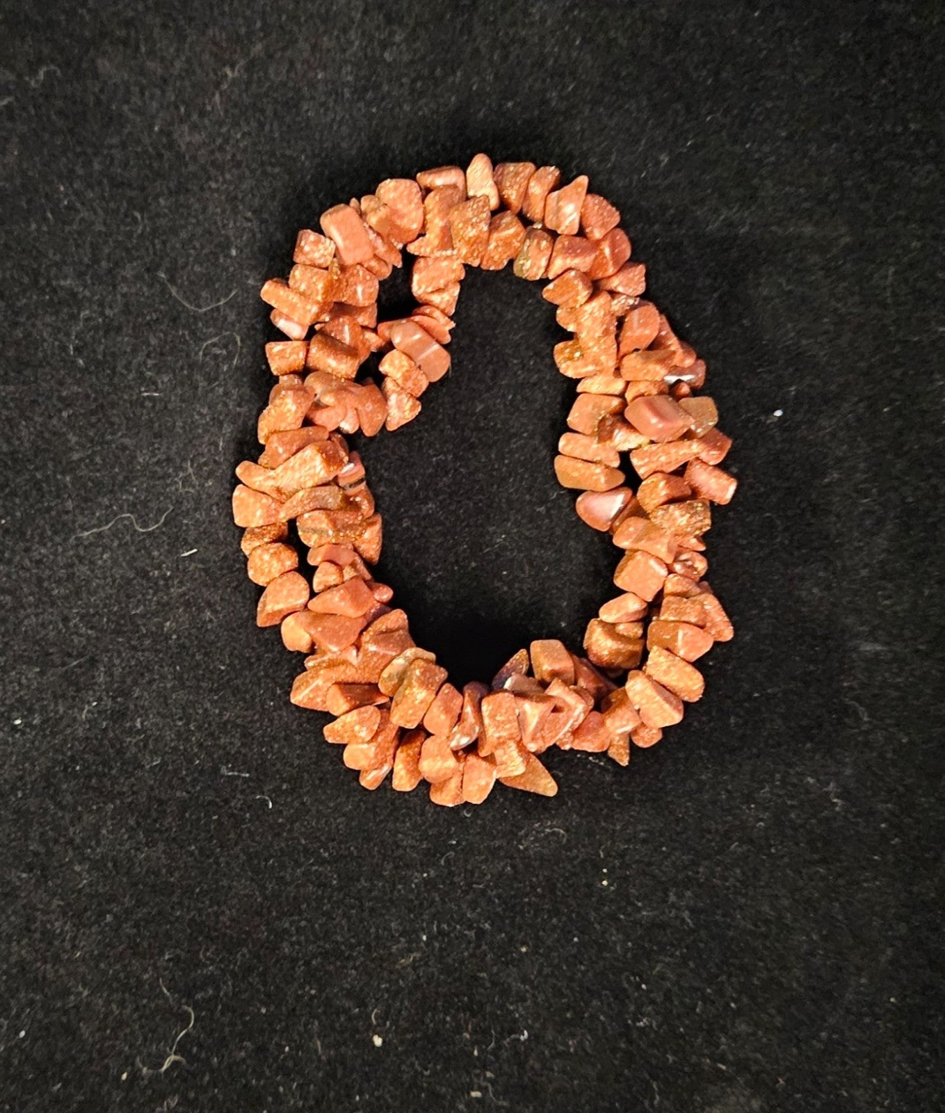 RED/COPPER COLORED GOLDSTONE BRACELET STRETCH GENTLY USED