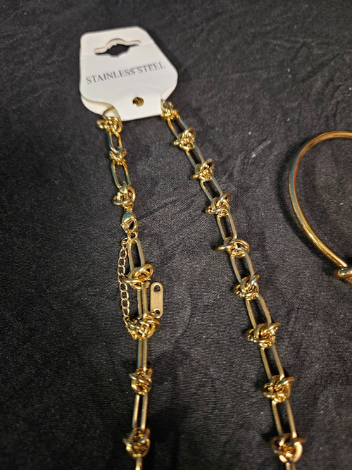 10K YELLOW GOLD PLATE OVER STAINLESS  KNOT CUFF BRACELET AND NECKLACE