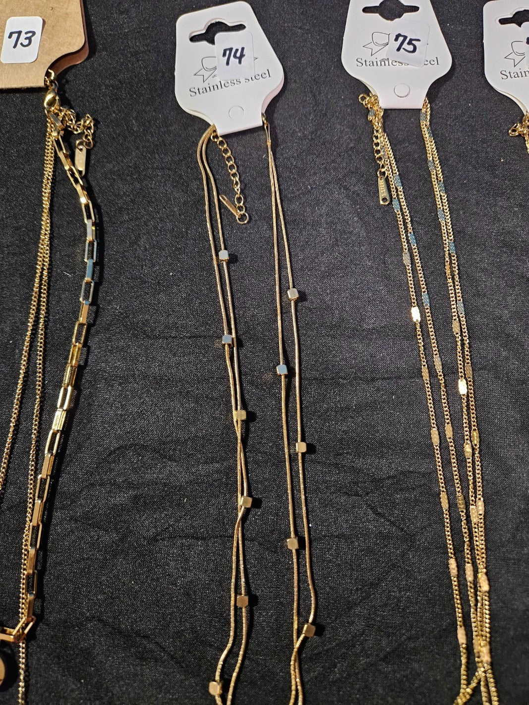 10K GOLD PLATE OVER STAINLESS DOUBLE/TRIPLE STRAND ASSORTED NECKLACE