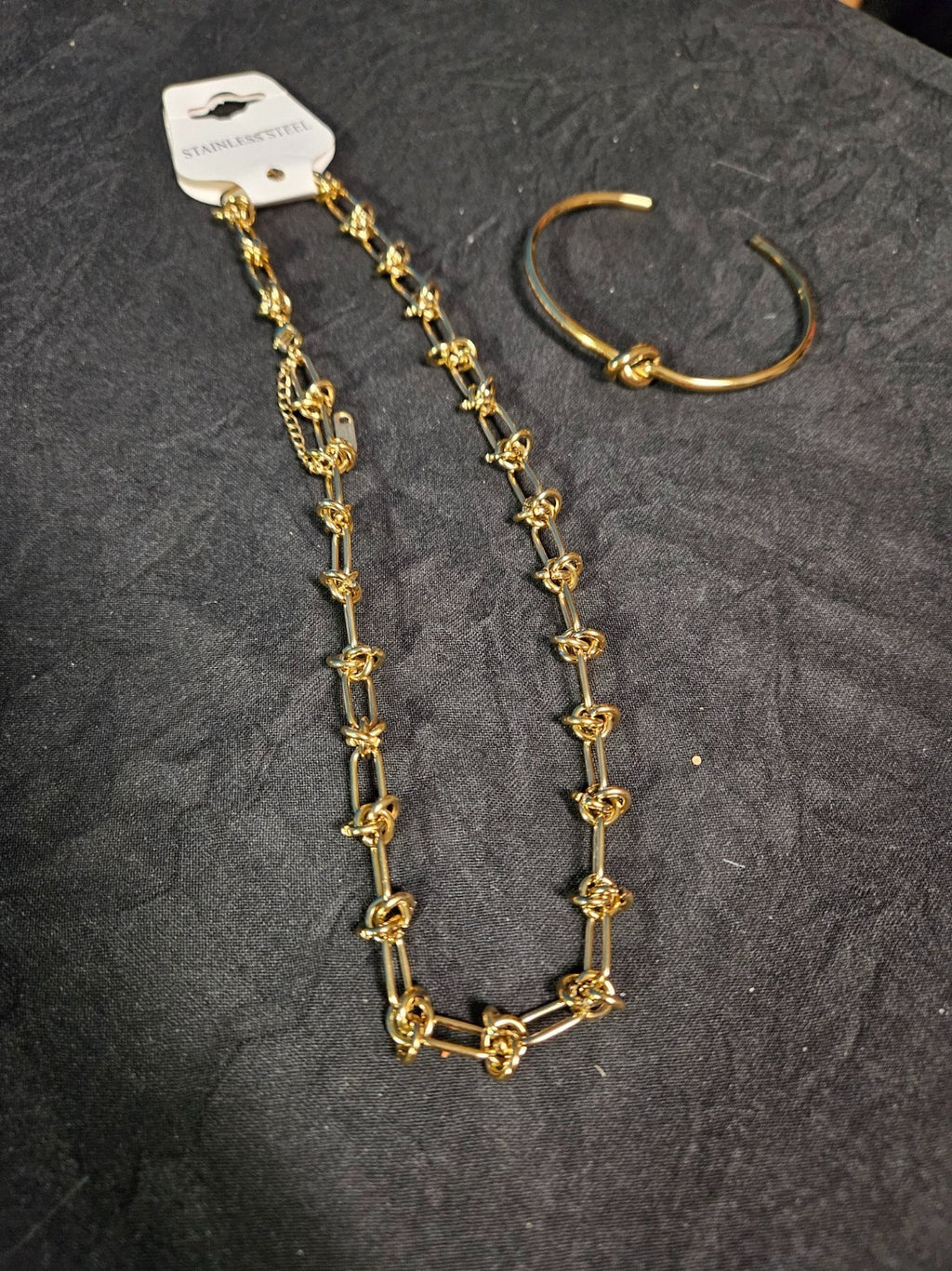 10K YELLOW GOLD PLATE OVER STAINLESS  KNOT CUFF BRACELET AND NECKLACE