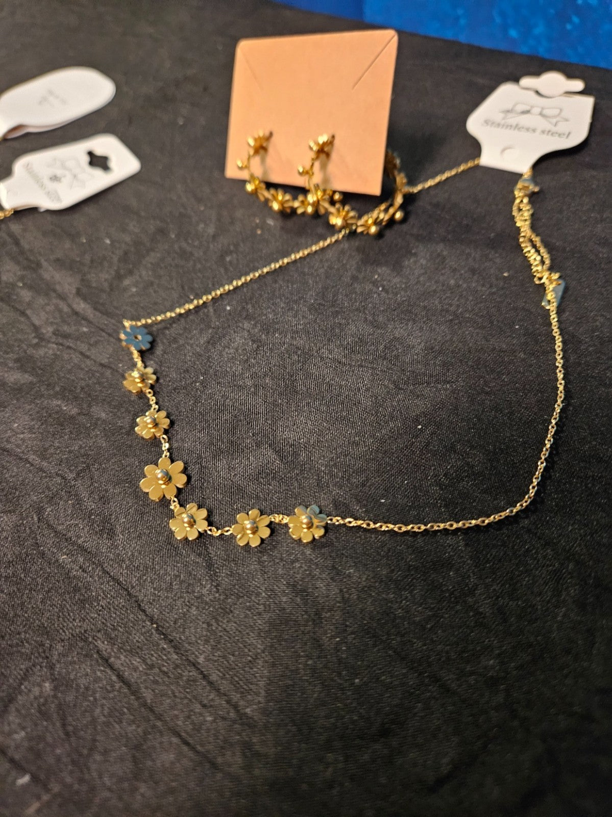 10K YELLOW GOLD PLATE OVER STAINLESS STEEL FLOWER HOOP EARRINGS AND NECKLACE SET