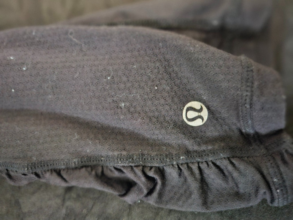 LULULEMON SIZE 6 WUNDER UNDER RUFFLE CROP LEGGINGS ZIPPER POCKET BLACK