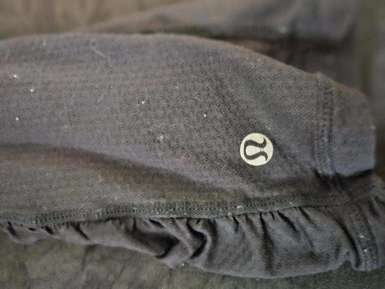 LULULEMON SIZE 6 WUNDER UNDER RUFFLE CROP LEGGINGS ZIPPER POCKET BLACK